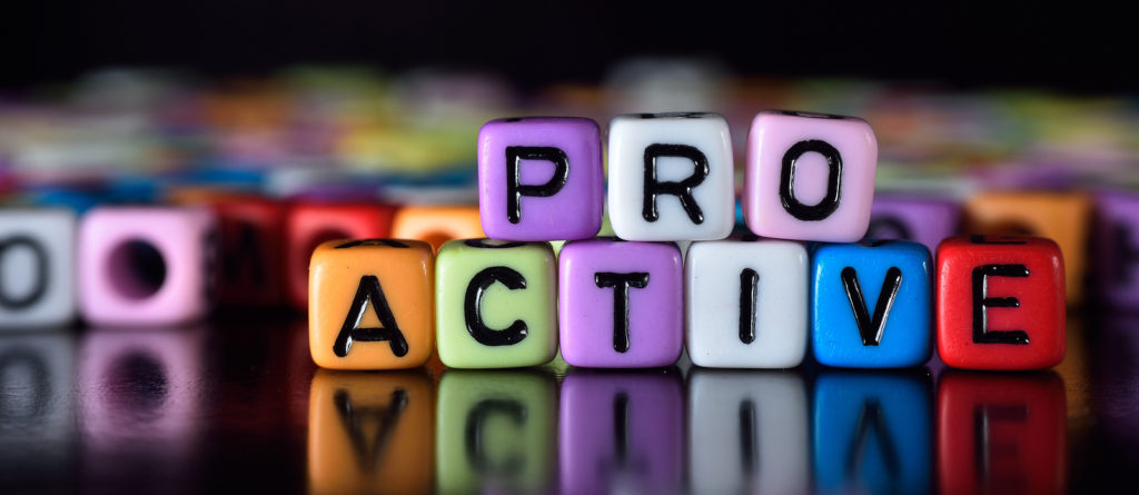Pro active word spelt with colorful letter beads