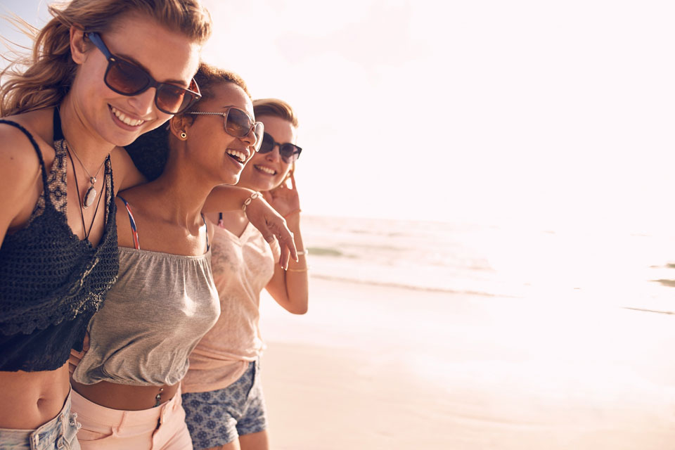 Three Young Women Enjoying Beach